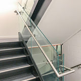 commercial handrail with glass panel